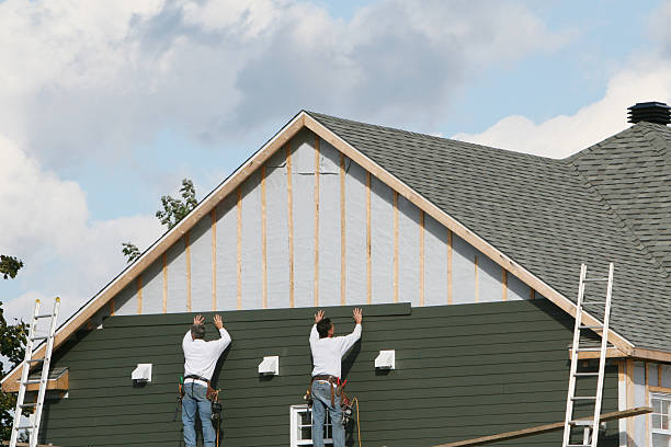 Professional Siding Installation technician working in South Boston, VA